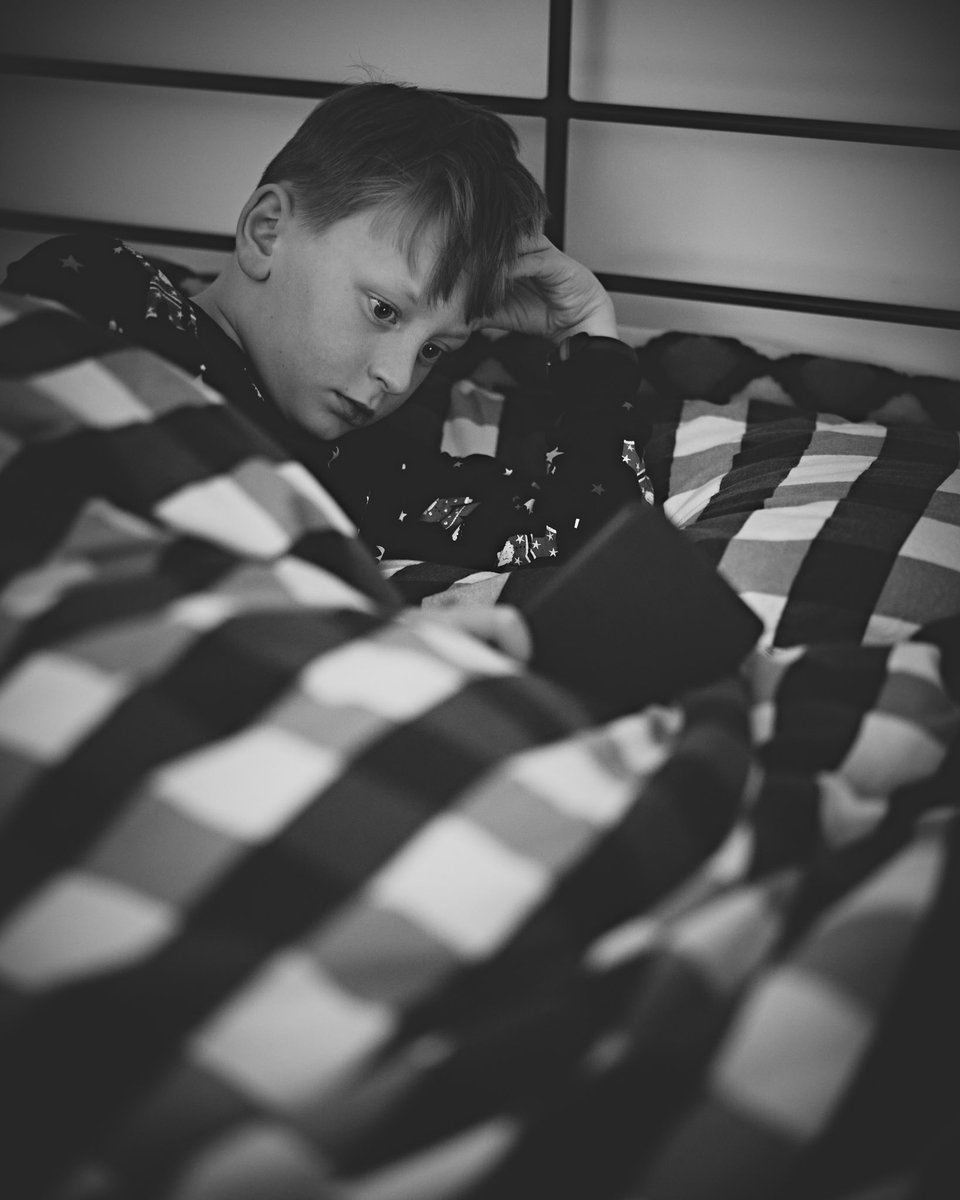 mark_stevo's tweet photo. Day 68 // He's has become a bit of a bookworm, and he won't go to sleep without reading a few chapters. We got him a Kindle for Christmas and he's hooked on Tom Gates books. 

A7CR + 1.4/50mm
•
•
•
•
#project366 #project365 #project365_2024 #project366_2024 #dailyphotography https://t.co/X2WMnIJOa3