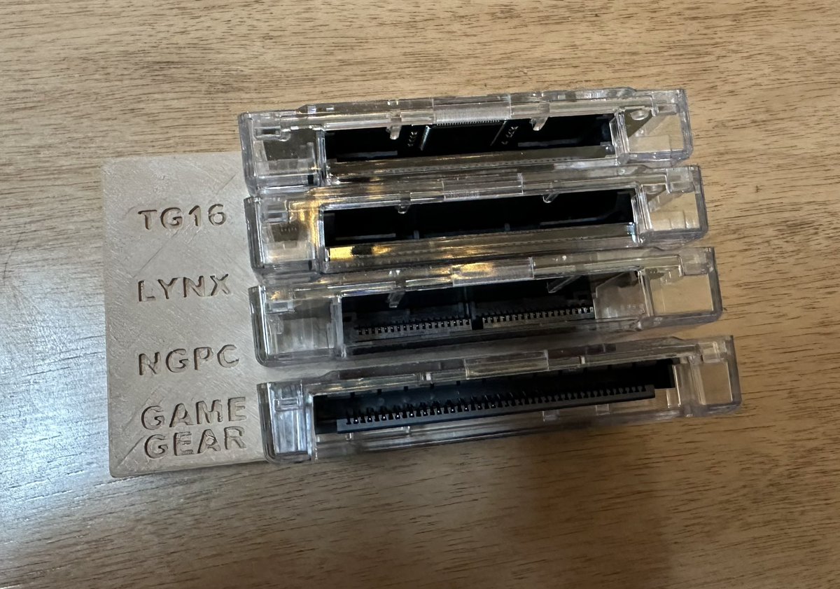 UnicityPoint's tweet image. The turbografx16, lynx and neo geo pocket adapters for the Analogue Pocket are finally here! Now the majority of my retro handheld physical collection is playable on one system 😍 also, the 20 minute design 3d printed rack I made for them 🧐