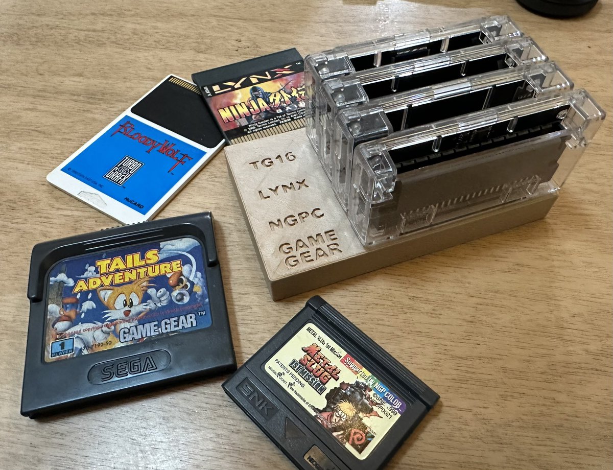UnicityPoint's tweet image. The turbografx16, lynx and neo geo pocket adapters for the Analogue Pocket are finally here! Now the majority of my retro handheld physical collection is playable on one system 😍 also, the 20 minute design 3d printed rack I made for them 🧐