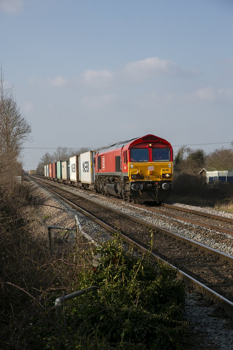 DB Cargo Class 66/0 No.66019 at Cherry Tree Lane Crossing Soham on 8th March 2024 working 4L38 10:57 East Mids Gateway-Felixstowe Central.#class66 #Soham