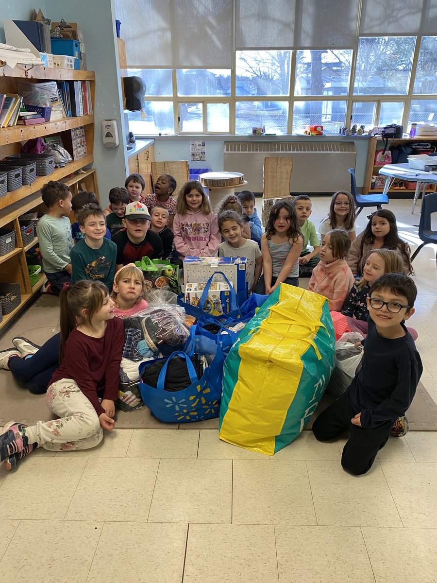 The Holy Rosary Grade 1 class collected clothes, toys and books to donate to St. Vincent de Paul for our Lenten project. They helped carry it to the front of the school so I could put it in my car. Great job boys and girls! You helped many people in need.