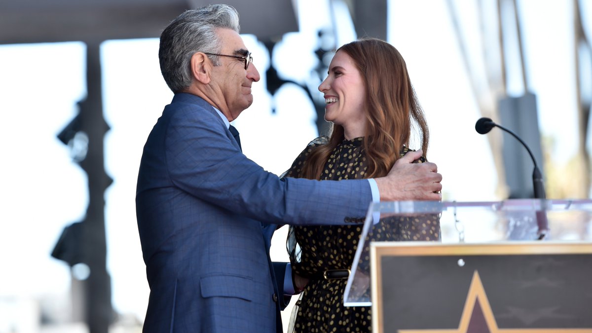 THR's tweet photo. Eugene Levy received his star on the Hollywood Walk of Fame, alongside his on- and off-screen family including Catherine O'Hara, Sarah Levy and Jason Biggs https://t.co/qWKYTLT79X
