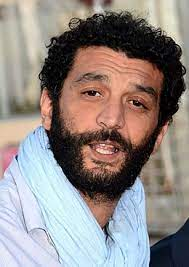 merlinpapin3's tweet image. .@FredOL69007 #PremièreFoisauCinéma

#RamzyBedia dans Le Ciel, les Oiseaux et... ta mère ! de Djamel Bensalah (1999) il avait 27 ans