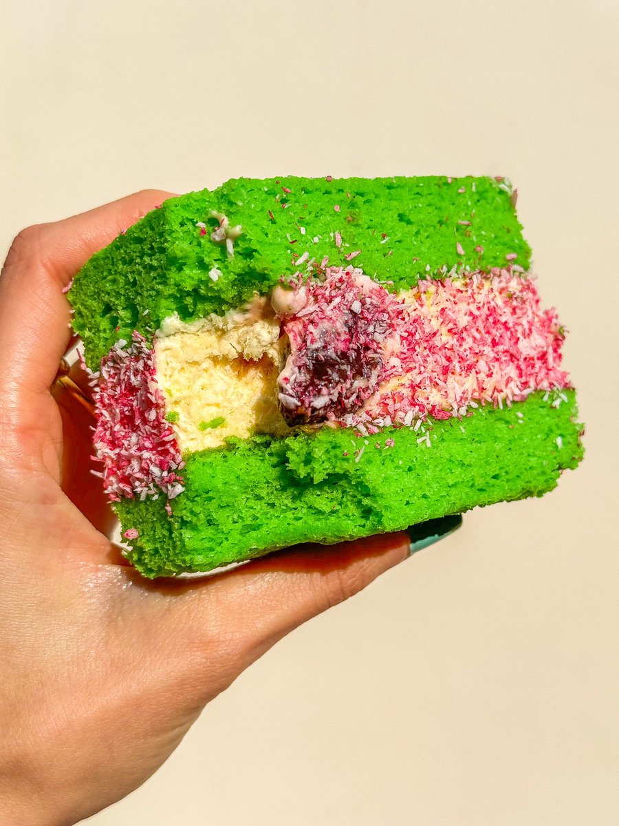 Pandan cake ice cream Sando: Fluffy pandan cake &amp; milk ice cream stuffed with glazed strawberries then hand dipped in pink coconut.
Available in soho 🫶