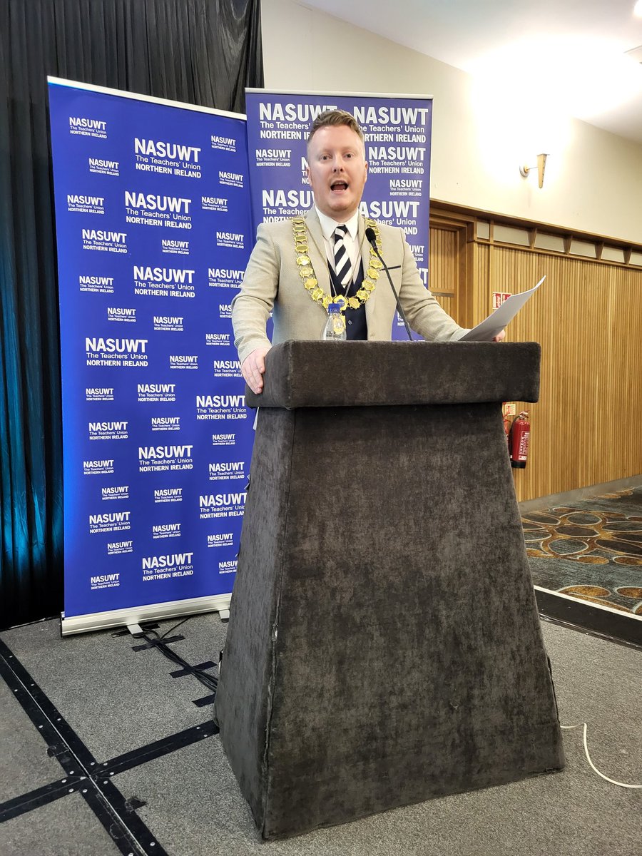 Our NI President <a href="/Ronan_Sharkey/">Ronan Sharkey</a> is addressing members at #NASUWTNICONF24 
He told them: "The gap between what we earn and what it takes to survive is widening by the day. We cannot stand idly by while our teachers, school leaders and lecturers are left behind their counterparts."