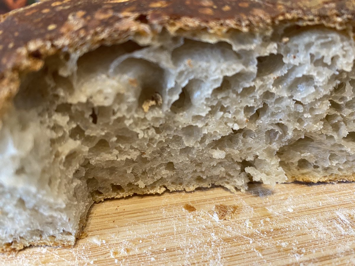 sarahjbingham's tweet photo. Not the prettiest loaf but the texture getting better every week and won’t  last past lunch time #sourdough #bread #saturdaybaking https://t.co/Jb81tPc2df