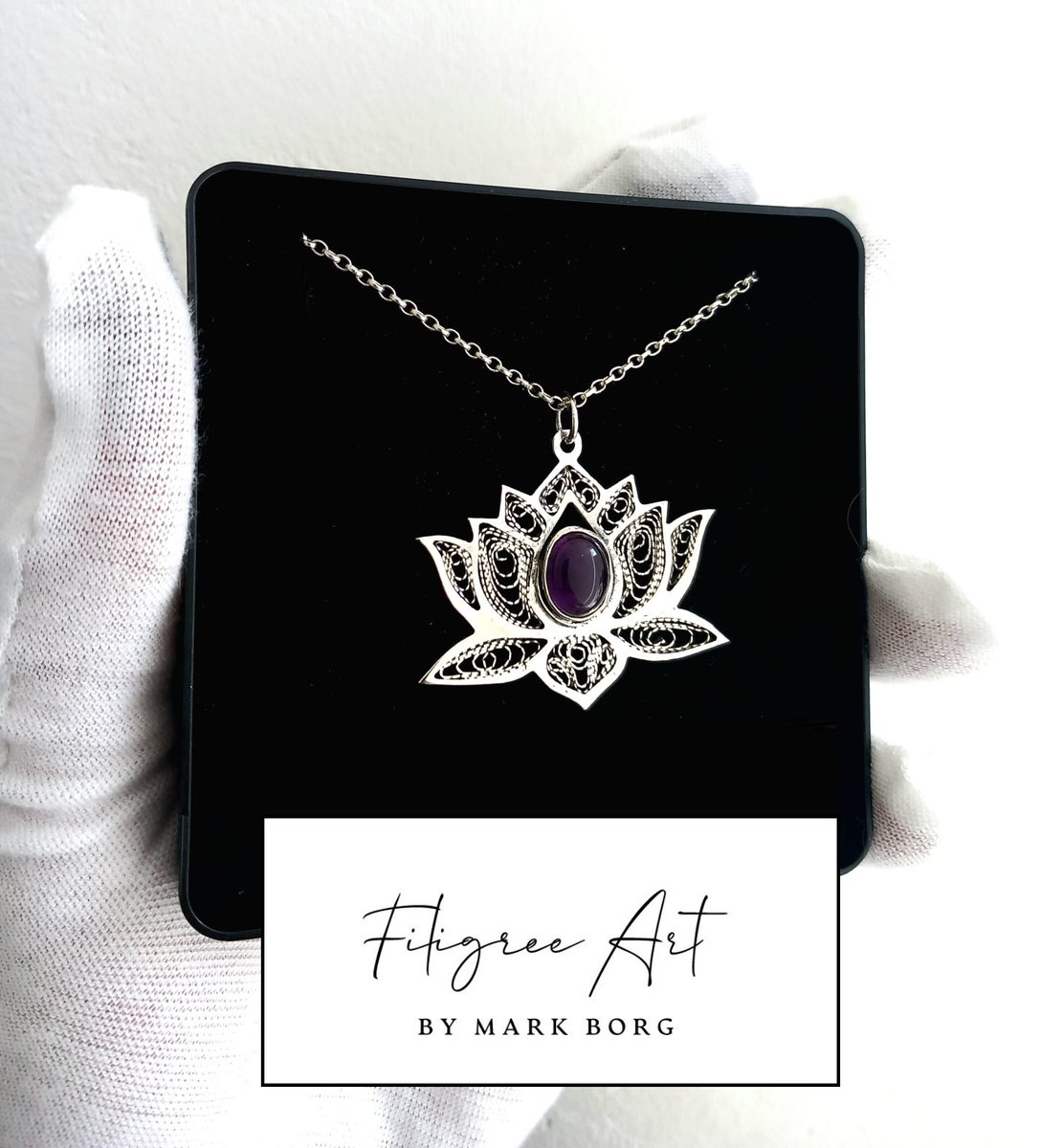 'Lotus'  A handcrafted sterling silver pendant adorned with a deep purple amethyst.  €80
#HandcraftedJewelry #SterlingSilver #amethystStone #ArtisanCrafted
#UniqueDesigns #JewelryLovers #ElegantAccessories #GiftIdeas #ShopLocal #malta #filigree #markborg #filigreeart