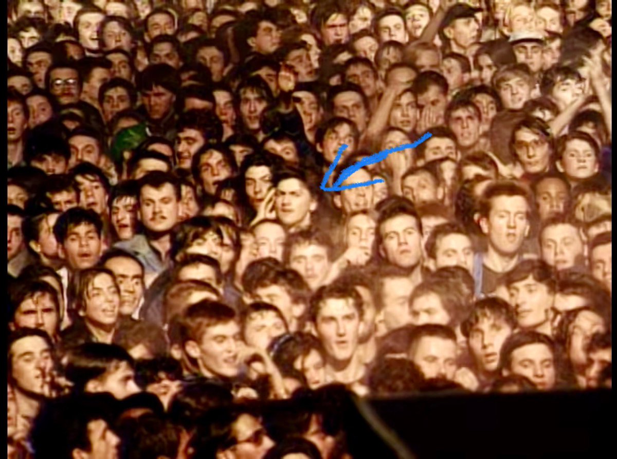 Jon_Chowthee's tweet photo. Am I imagining or is that @iamsrk in the crowd at Michael Jackson's concert in Bucharest, 1992? 🤔 https://t.co/H9m7EIPBgM