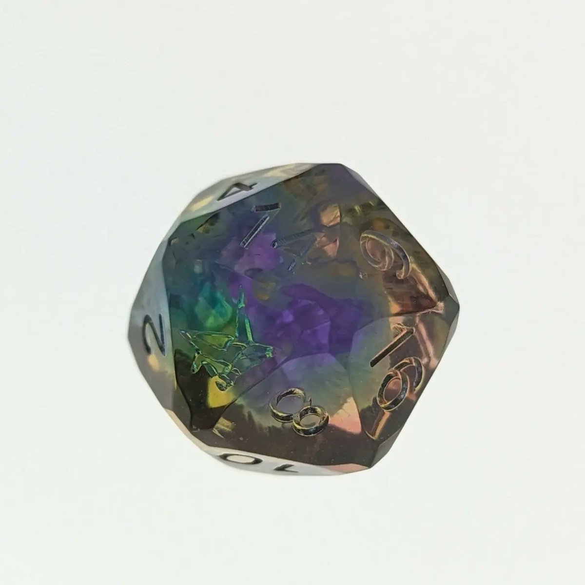 Raw gem faceted D20.

Raw, unsanded, unpolished, uninked, unfinished.

#handmadedice #D20 #DungeonsandDragons #TTRPGDice