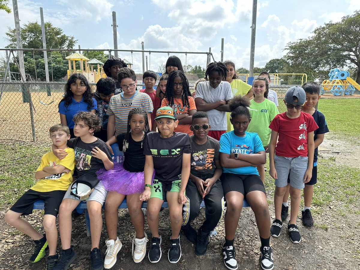 They call this their “game face” look.  #GettingTheirGameFaceOn #fieldday #tugofwar #getready