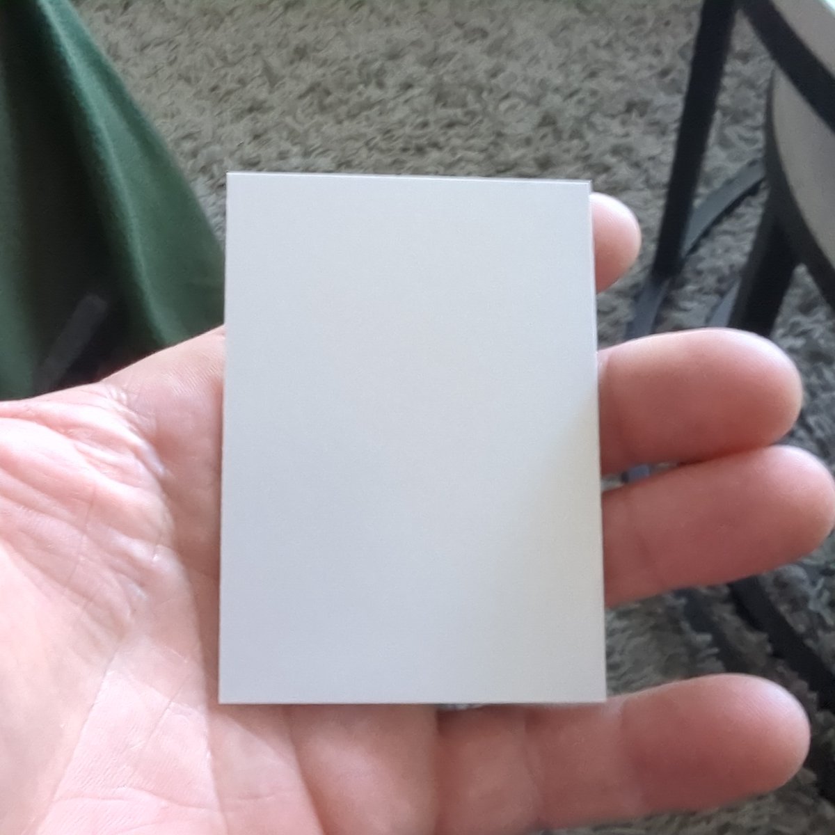 PINKASSBEN's tweet photo. @Topps just opened a 2024 hanger and one of my cards was just blank holofoil on front and blank white paper on back.  I'm confused https://t.co/fcfdvpR8em