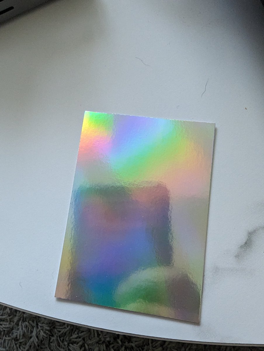 PINKASSBEN's tweet photo. @Topps just opened a 2024 hanger and one of my cards was just blank holofoil on front and blank white paper on back.  I'm confused https://t.co/fcfdvpR8em