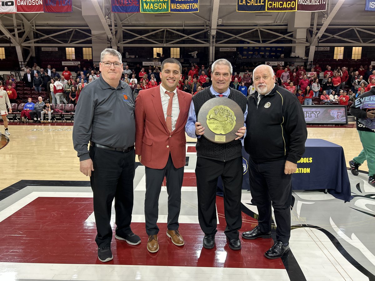 RegisHighSchool's tweet photo. Regis's varsity basketball team won the CHSAA Class B state title Friday with a victory over St. Mary's of Buffalo. With students, families, faculty, and alumni forming of a sea of red in the stands, the team claimed Regis's first state title since 2018. https://t.co/T4oVo8l1FH https://t.co/cJjaprtzwk