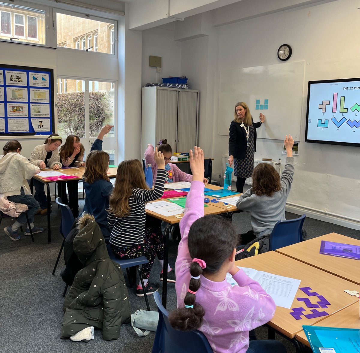 RoyalHighBath's tweet photo. We had a great time this morning at our Maths masterclass for Year 5 girls various schools in Bath. The marvelllous mathematicians who joined us had a great time exploring binary monsters, polynomials, reflection and rotational symmetry and more! #mathsforlife #designedforgirls https://t.co/NllasIbp9r