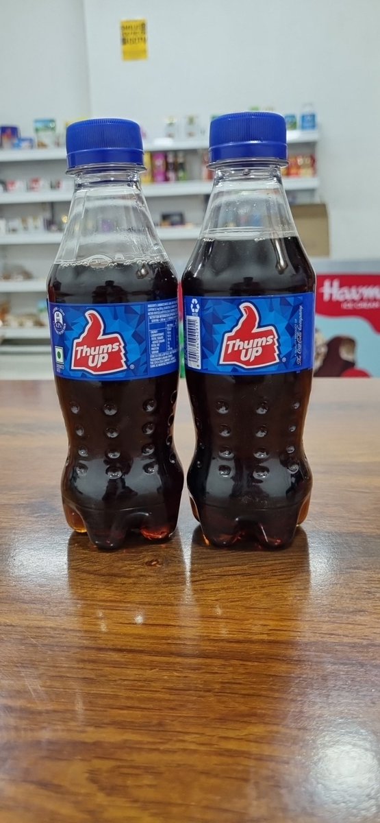 Significant difference between quantity of colddrink #thumsup <a href="/ThumsUpOfficial/">Thums Up</a> 
(Ofcourse these are seal pack bottles)