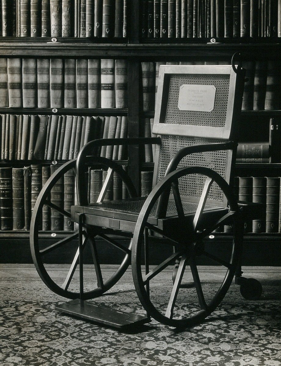 A wheelchair belonging to Michael Faraday, designed by Thomas Twining III, ca. 1845, displayed at the Athenaeum Club, London. Photograph, ca. 1930. <a href="/ExploreWellcome/">Wellcome Collection</a>  wellcomecollection.org/works/zu3f6vxf…