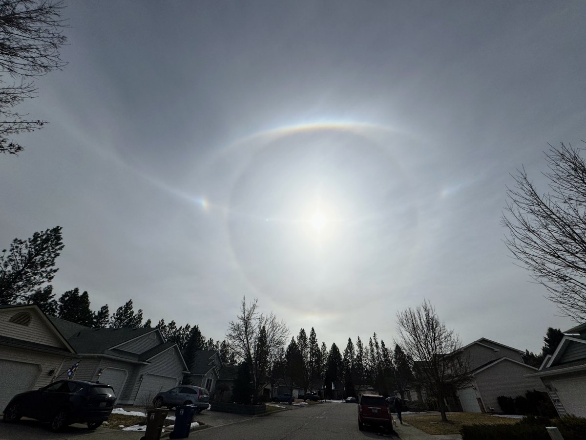 carplips's tweet photo. Some awesome atmospheric optics over Spokane this PM.  A full 22° Halo, Parahelic Circle, Parhelia (sun dogs) Upper Tangent Arc, and even hints of a Lower Tangent Arc. The first image is unedited, and the second is edited to show coloration.  #wawx #idwx #atmosphericoptics https://t.co/bpingToFNT