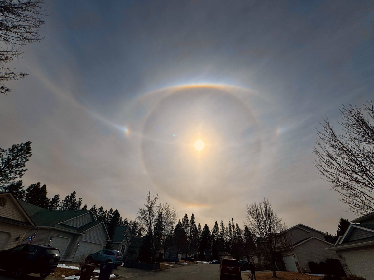 Some awesome atmospheric optics over Spokane this PM.  A full 22° Halo, Parahelic Circle, Parhelia (sun dogs) Upper Tangent Arc, and even hints of a Lower Tangent Arc. The first image is unedited, and the second is edited to show coloration.  #wawx #idwx #atmosphericoptics