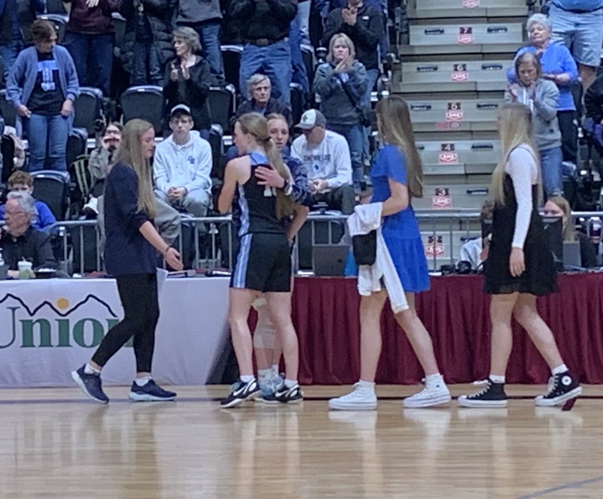 Cheyenne East’s Bradie Schlabs and Cody’s Molly Hays share a moment after the Class 4A third-place game. #competitors #classy
