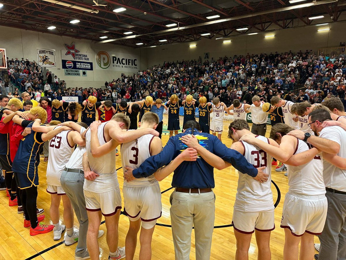 WylieTom's tweet photo. Box Elder and Manhattan Christian coming together for a post game moment of solidarity and prayer before the trophy ceremony. 

#mtscores https://t.co/1f73SjvEEB