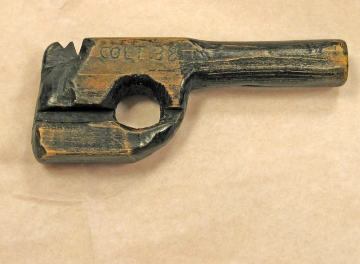 In March 1934, infamous gangster John Dillinger used this fake pistol to escape from the Lake County Jail in Indiana.