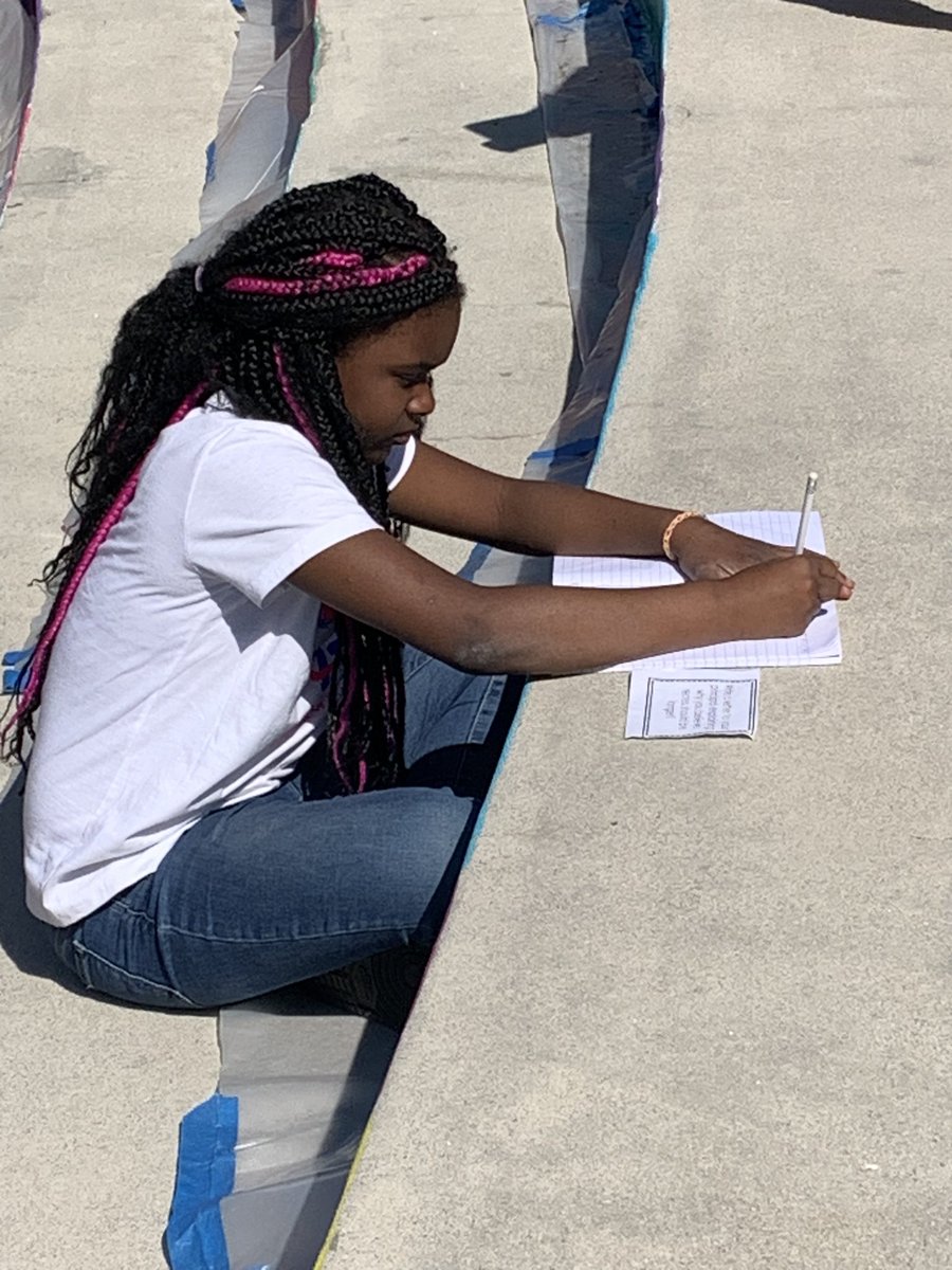 SettleBetsy's tweet photo. It was a beautiful day to take our writing time outside.  I love how focused the kids were on writing their opinions and enjoying the sunshine. @MabletonES https://t.co/fNL870pCw1