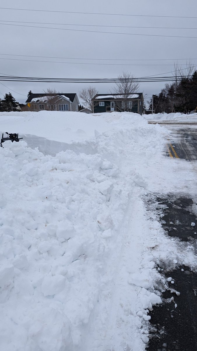 mgrideoutnl's tweet photo. Our road was finally cleared between 7pm & 8pm last night (sat). 2 cuts were made. Snowblowing this AM & clearing half of the road. Snow blower is at the street curb. Had to clear to the end of my driveway... which is to the yellow line. @townofparadise #nlwx #nlroads https://t.co/CmPl1NNcbk