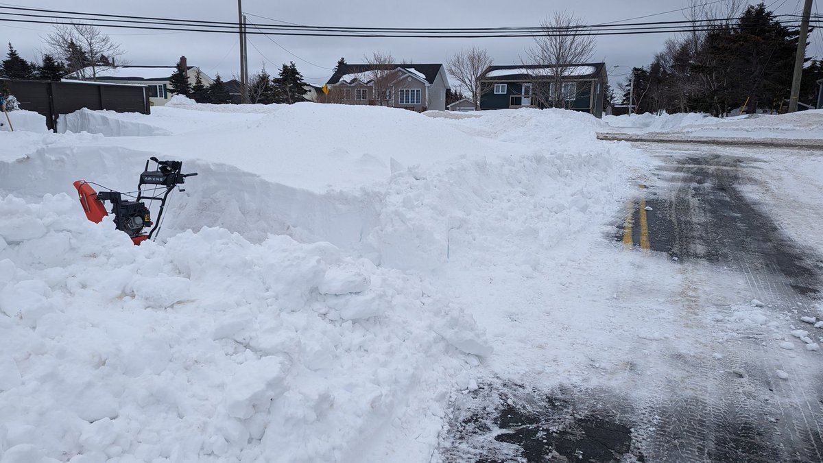 mgrideoutnl's tweet photo. Our road was finally cleared between 7pm & 8pm last night (sat). 2 cuts were made. Snowblowing this AM & clearing half of the road. Snow blower is at the street curb. Had to clear to the end of my driveway... which is to the yellow line. @townofparadise #nlwx #nlroads https://t.co/CmPl1NNcbk