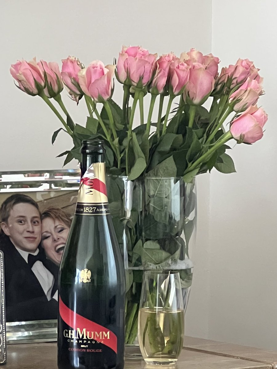 One son, his mum , flowers and a bottle of Mumms for #MotheringSunday