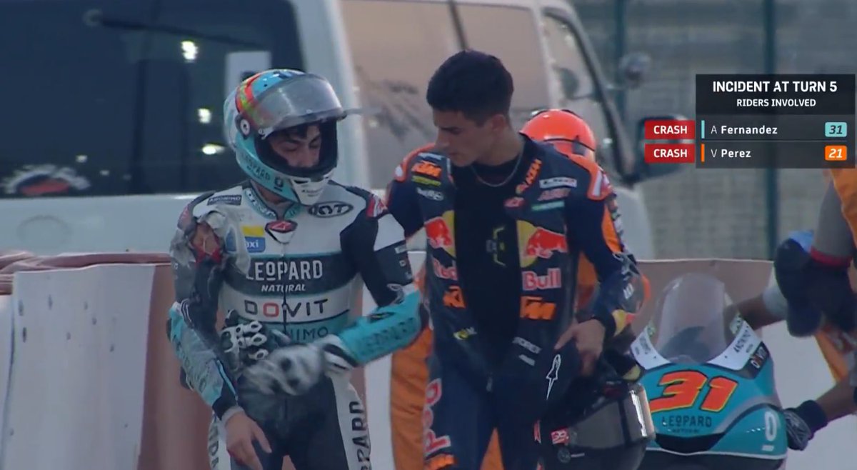 crash_motogp's tweet photo. Thankfully Adrian Fernandez &amp; Vicente Perez have walked away from that crash. However, check out the ripped leathers on Fernandez’s right shoulder 😳

#MotoGP #QatarGP https://t.co/3nf1i9tVC7