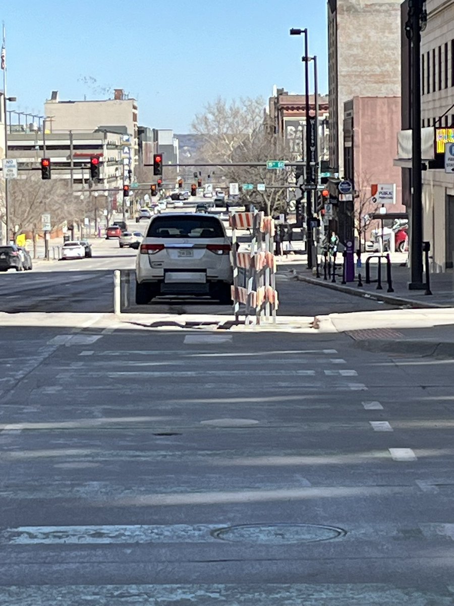 MTBJason's tweet photo. @GATOmahaNE @omahapublicwrks @omahabydesign @lamprynearson This was the bike lane yesterday a while after the parade. The city needs to do better. https://t.co/wUMTafOFVp