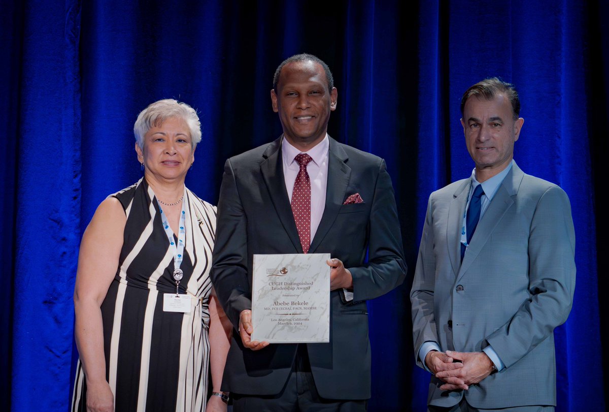 Barnabas Alayande (@drbarnabasalay) on Twitter photo Of shoulders and giants: Celebrating the larger than life academic surgeon, astounding visioner, and leader, Dean of Medicine <a href="/ughe_org/">University of Global Health Equity</a> <a href="/cosecsa/">COSECSA</a>'s <a href="/abebesurg/">Abebe Bekele, MD</a> Center for Equity in Global Health co-Chair, dad, mentor, & friend @ #CUGH2024 awards. Thank you for humbly blazing trails Of shoulders and giants: Celebrating the larger than life academic surgeon, astounding visioner, and leader, Dean of Medicine <a href="/ughe_org/">University of Global Health Equity</a> <a href="/cosecsa/">COSECSA</a>'s <a href="/abebesurg/">Abebe Bekele, MD</a> Center for Equity in Global Health co-Chair, dad, mentor, & friend @ #CUGH2024 awards. Thank you for humbly blazing trails