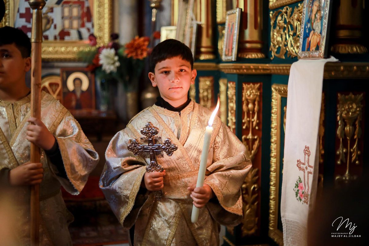 I just saw this picture of my nephew (also named Khalil) from today's divine liturgy at Saint Porphyrius church in Gaza City. I am so proud of him and miss him dearly, and I can't imagine what kids are going through in Gaza