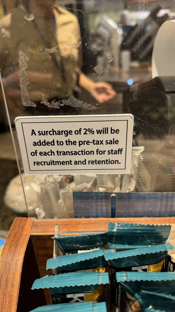 The @peetscoffee stand in Terminal 1 at the @SanDiegoAirport has this sign, automatically adding 2% to your bill for staff recruitment and retention. I have never seen this before- have you? #staffrecruitment #staffretention #laborlaw #employmentlaw