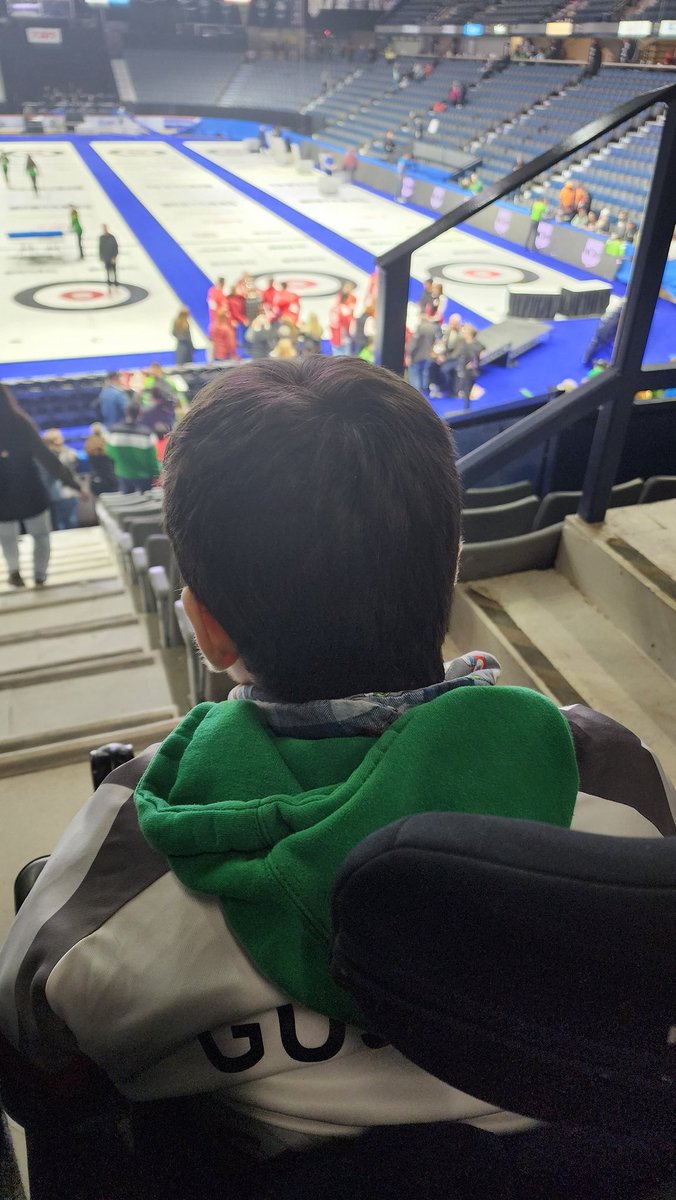 Took #CheeringRylan a bit closer just as they kicked us out of the Brandt Centre. He was cheering hard during the game, but took in everything afterwards quietly. Thank-you to @TeamMcEwen for a great week, and congratulations to @TeamGushue!