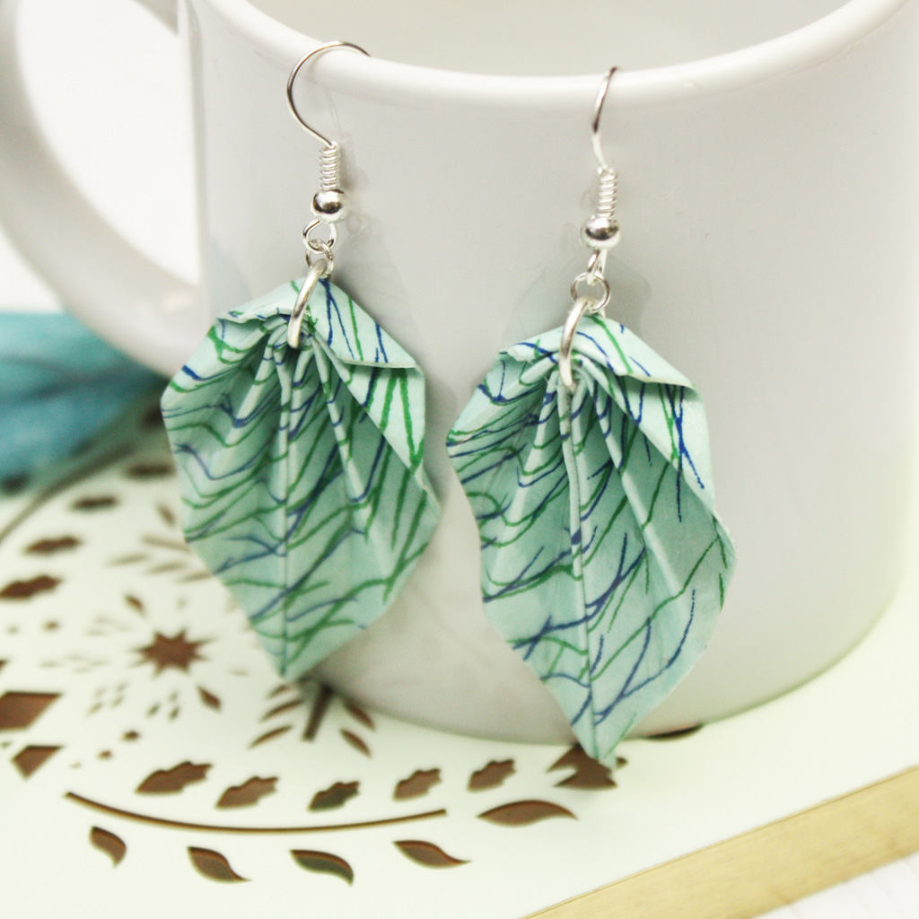 OrigamiBoutique's tweet photo. Bring colour to your face with these Light Blue Sea Plants Origami Leaf Earrings, they’ll dangle beautifully and frame your face with an aura of energy.

https://t.co/wD30h4ucap https://t.co/YRu2vVj1TG