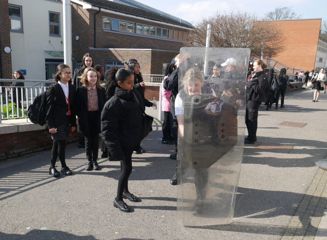 A huge thank you to @metpoliceuk for celebrating #InternationalWomensDay with us. Our students loved learning about all the protective equipment officers use and were delighted to have the opportunity to try the shields!