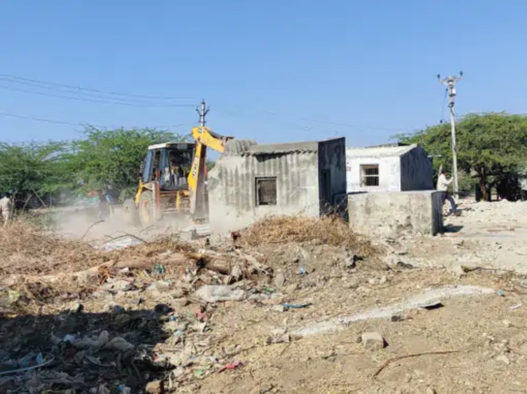 Demolition drive against illegal encroachment near Salaya Port in Dwarka