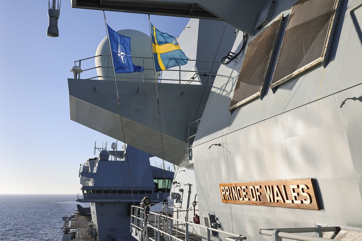 Welcome to the Alliance! The Swedish flag has just been raised at the @NATO HQ. Välkommen till laget! Last year the UK Carrier Strike Group worked closely with Swedish forces, including a memorable visit to Göteborg, and we look forward to doing so again. #StrongerTogether