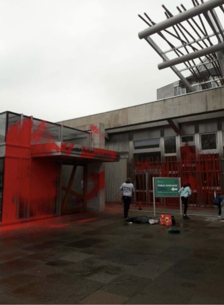 Latest act of vandalism at the Scottish Parliament. 3 fire extinguishers worth of red paint sprayed at entrance by This Is Rigged - the group which interrupted FMQs 9 times last week - to protest “a lack of adequate response to rising food insecurity in Scotland” @LBC @LBCNews