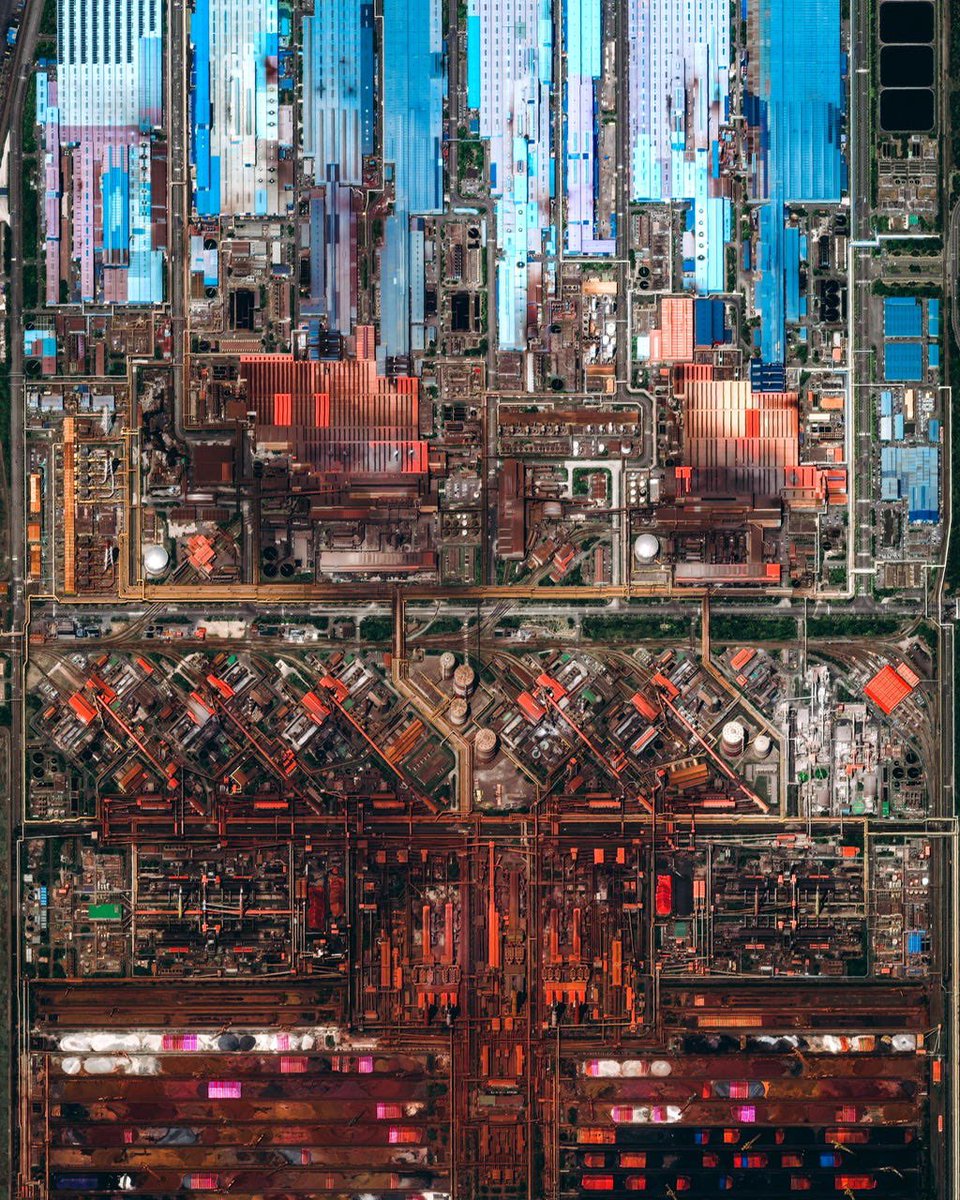 This isn’t a close up of a computer chip, it’s an aerial photo of a giant steel plant in South Korea called Gwangyang Steel Works (courtesy of <a href="/DOverview/">Daily Overview</a>).