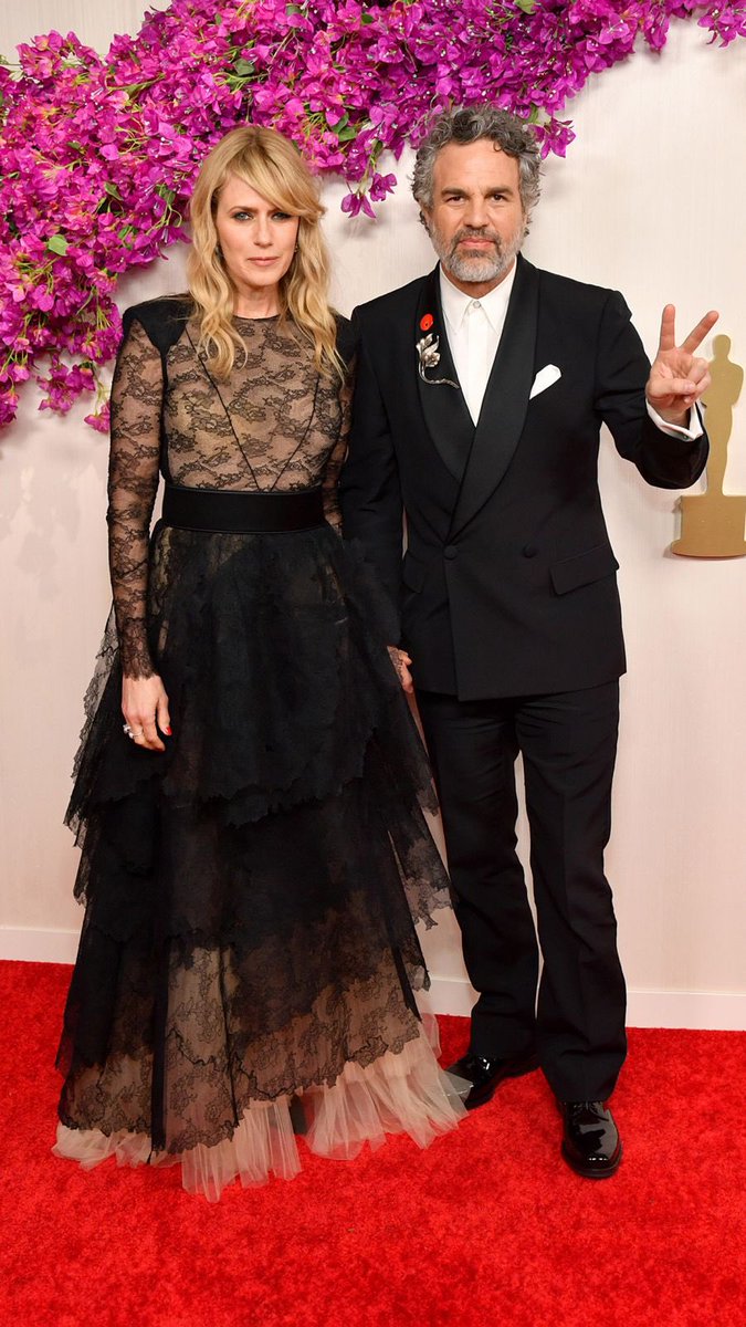 Actors #MarkRuffalo wearing Givenchy custom Haute Couture and his wife #SunriseCougney wearing Givenchy Haute Couture Spring Summer 2018 outfit to the #Oscar2024.