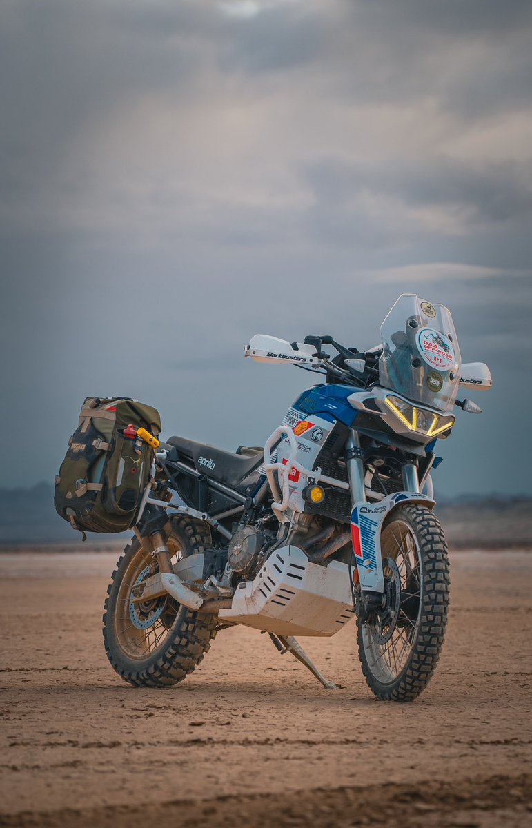 So, you have this perfectly accessorized Aprilia Tuareg 660. Which continent would you explore on it? 🌎 🌍 🌏 
.
This sweet bike is also armoured up with Outback Motortek crash bars and skid plate 🛡️ Backcountry soft panniers by <a href="/MoskoMoto/">MoskoMoto</a> 
.
#apriliatuareg #apriliatuareg660
