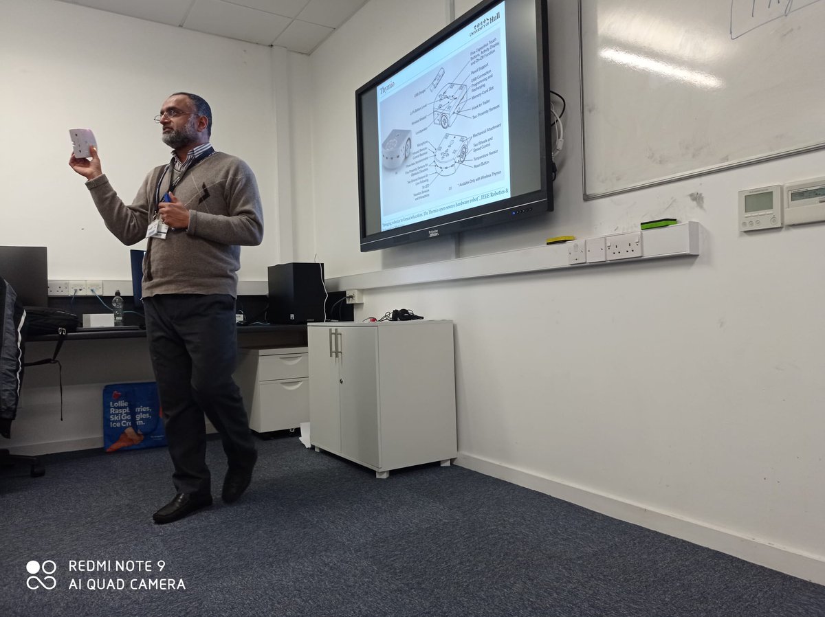 Dr Jamshed Iqbal telling students about Robotics and letting them program them - Hull Computer Science | Facebook