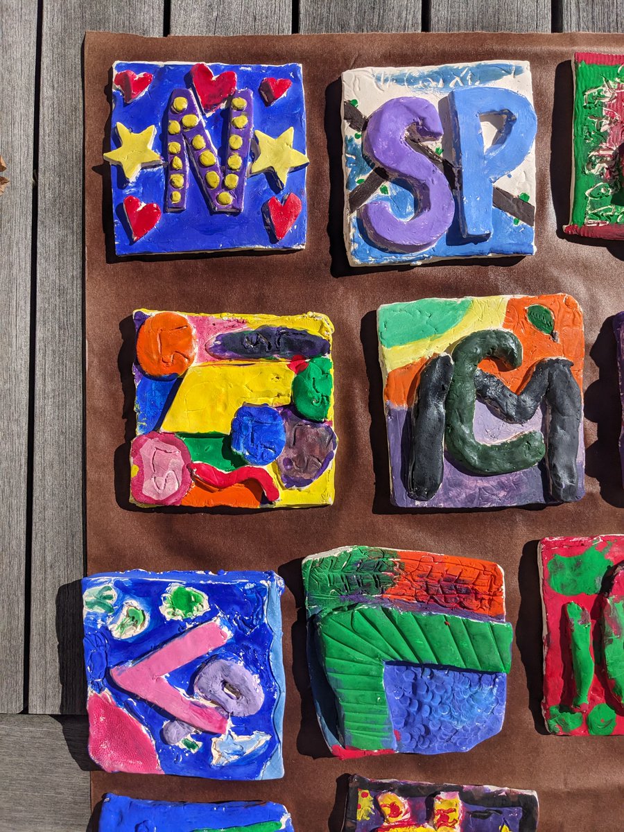 Finally some nice weather to get these outside so the paint can be sealed! 3rd did an awesome job on their clay letter tiles. #1relay4all <a href="/Relay_BCPS/">Relay Elementary</a>