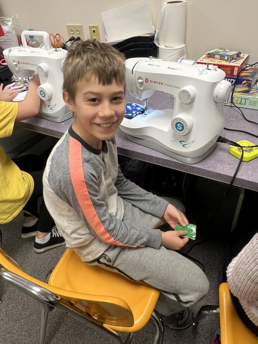 Maine's Positive Story of the Day ~ Mount Vernon Eleme School ~Volunteer, Margrit Stockford, is teaching 4th and 5th grade students the skill of sewing. using sewing machines and take their time making straight stitches.  They have made bean bags, rice socks and headbands. #NAESP