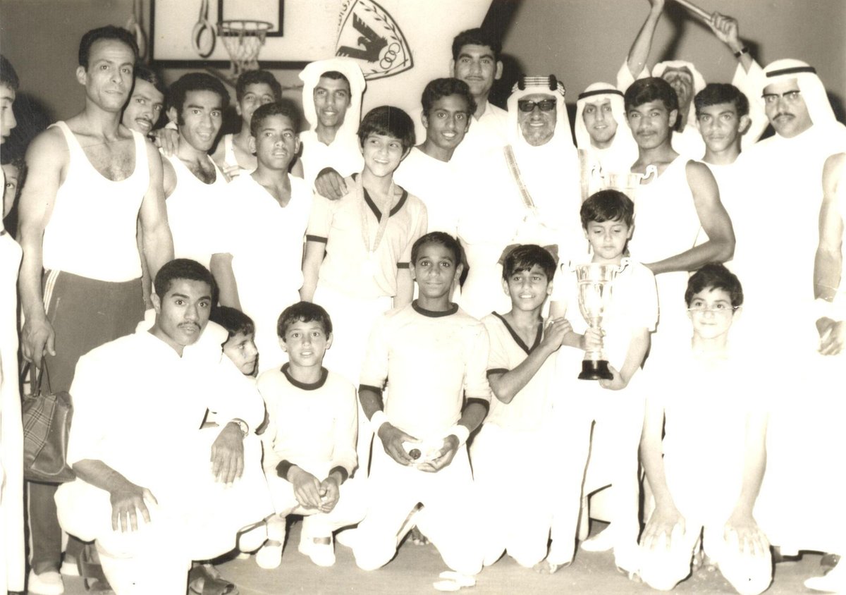 loughanib's tweet photo. صورة تعود الى 1973 لفريق الجمباز بنادي القادسية. جلوسا من اليمين: نبيل الصقعبي، وليد الصقعبي، باسم اللوغاني، محمد المنقب، فيصل العوضي، جمال بورسلي، محمد السلاحي. الصف الثاني من اليمين: لم اتعرف عليه، عبدالهادي الحرز، عبدالرحمن المذن،فريد العجيل، الشيخ عبدالله الجابر وآخرون. https://t.co/7udDW3JJ0J