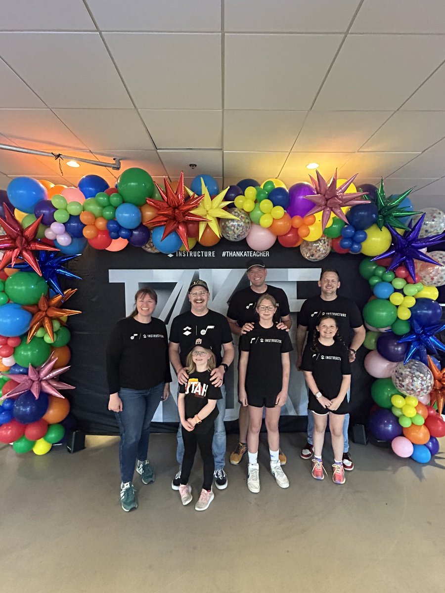 Instructure's tweet photo. Some of our employees are ready to see you all tonight! Make sure to stop by the backdrop and check out what exciting giveaways and prizes we have! #thankateacher @utahjazz #jazzmve https://t.co/zd9wZHKQPc