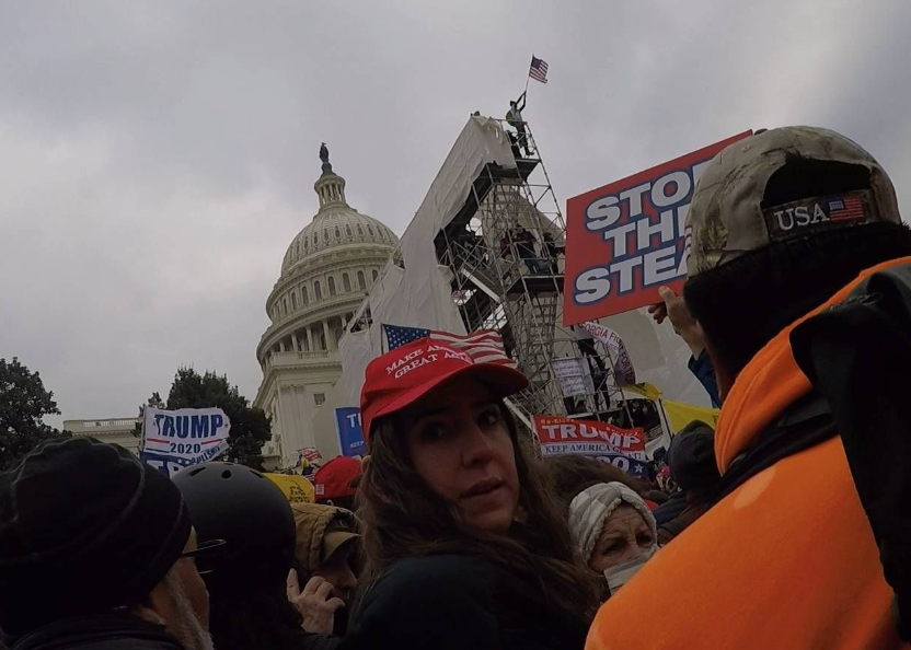 ryanjreilly's tweet photo. She's gathering some support from another (uncharged) Jan. 6 participant, seen here on the restricted grounds of the U.S. Capitol in this video evidence from a separate Jan. 6 trial. https://t.co/MOVeYaVvFj