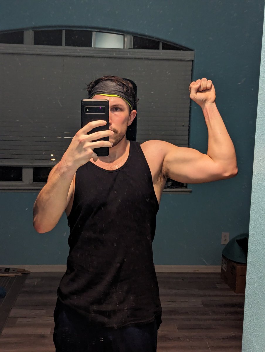 Heavybag work done for tonight. Please indulge me in a little post workout flex (you can tell I don't do it much because I don't know how to pose)